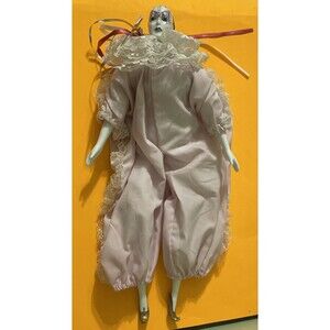 vintage porcelain clown or harlequin doll. Pink  Satin 18’